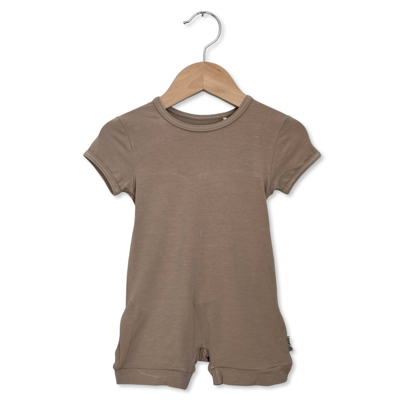 Brown baby romper on a hanger against a white background