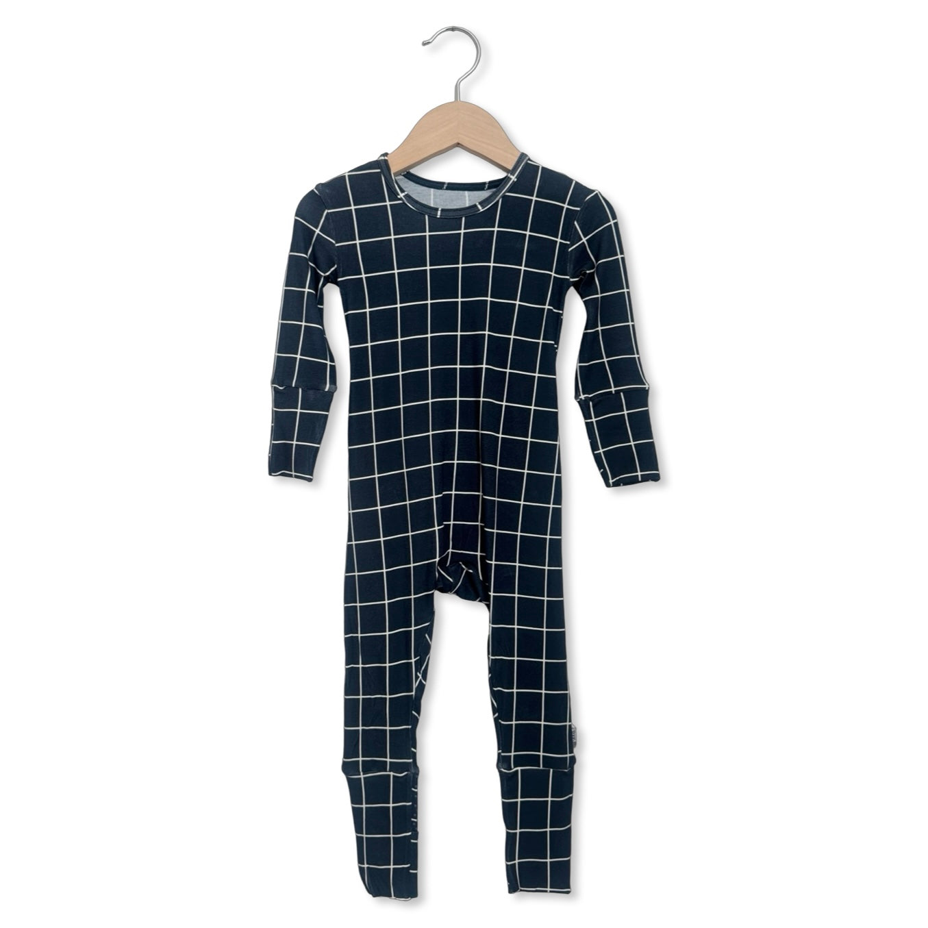 Navy blue and white checkered onesie on a hanger against a white background