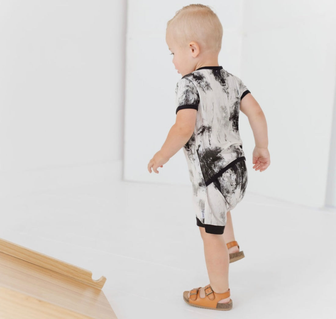 Caden & Crew Black Art Shorty Romper