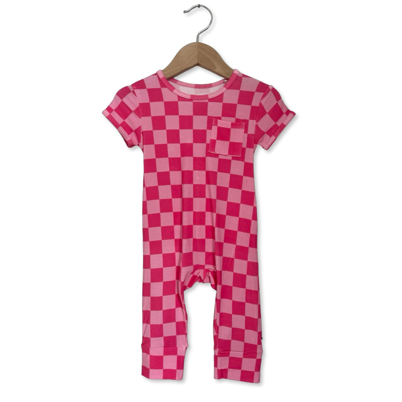 Pink checkered baby onesie on a hanger against a white background