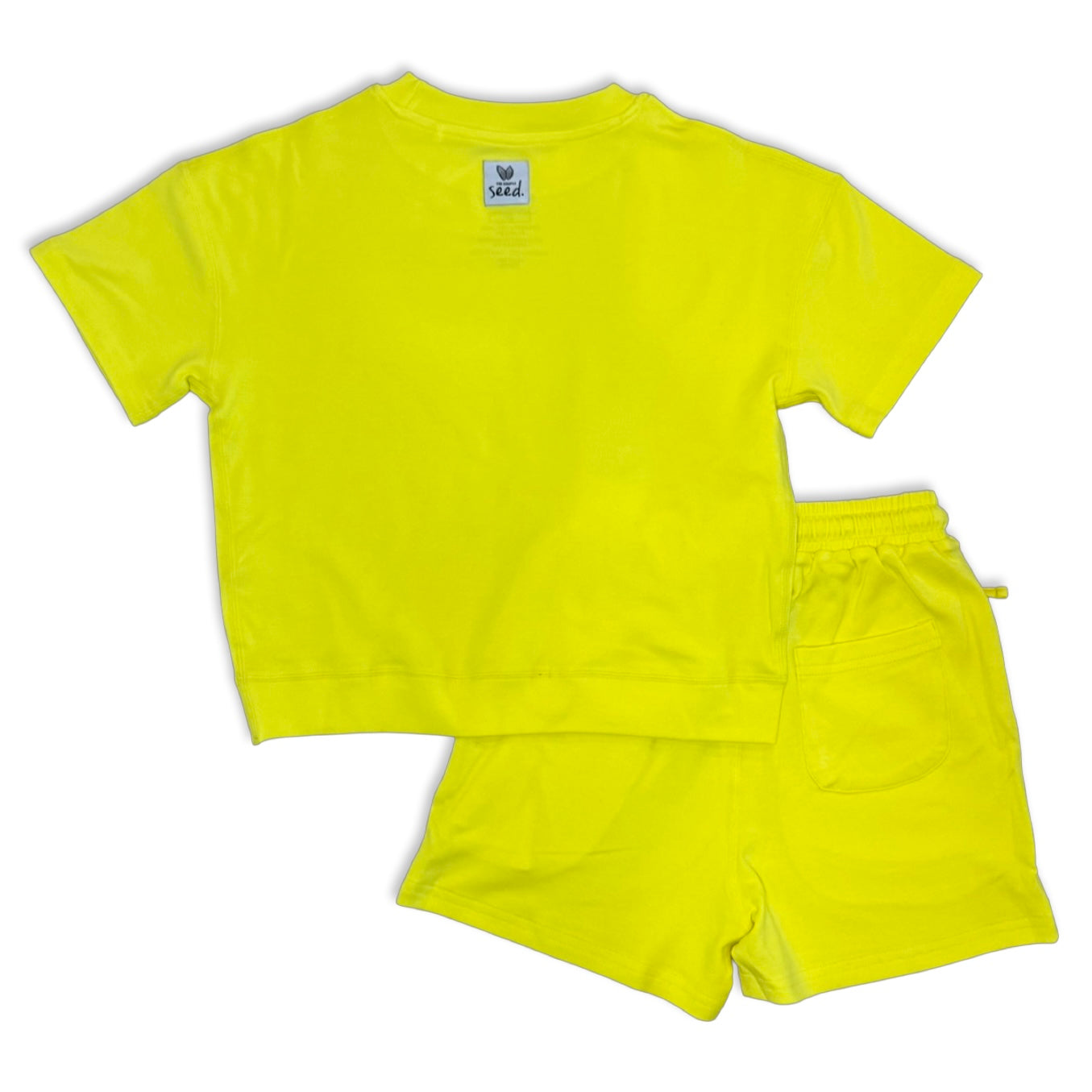Yellow t-shirt and shorts set on a white background