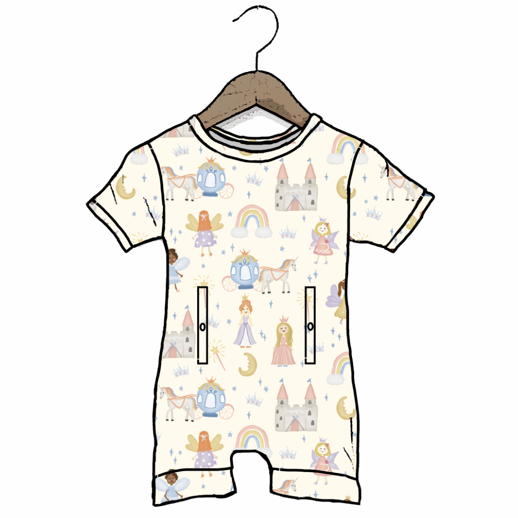 Baby romper with fairy tale pattern on a hanger against a white background