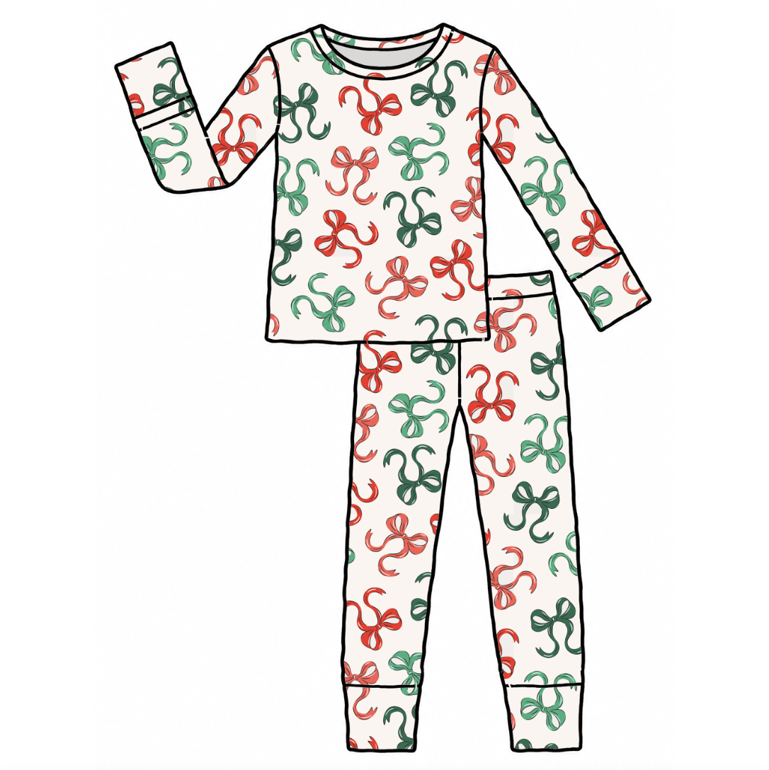 A flat vector illustration of a two-piece pajama set featuring a long-sleeve top and matching pants with an all-over abstract squiggle pattern in red and green on a white background.