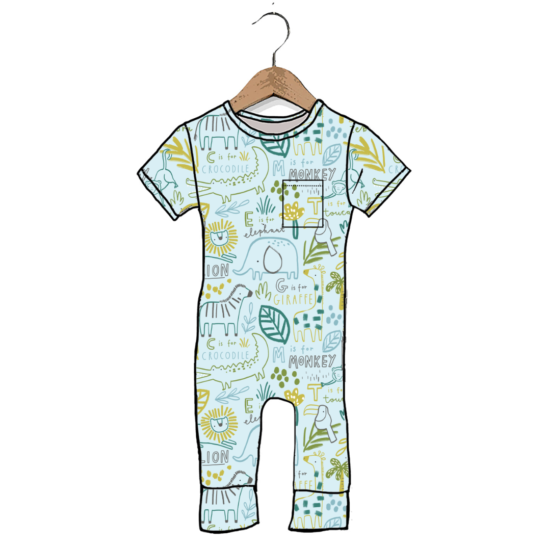 A baby one-piece romper with a light blue background and a playful animal-themed print featuring zebra, monkey, elephant, and giraffe illustrations in green, yellow, and brown, shown hanging on a wooden hanger against a white background.