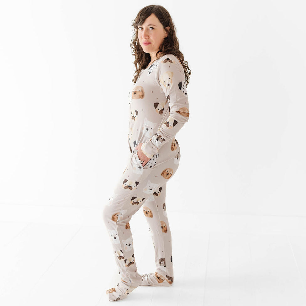 Woman wearing a patterned onesie on a white background
