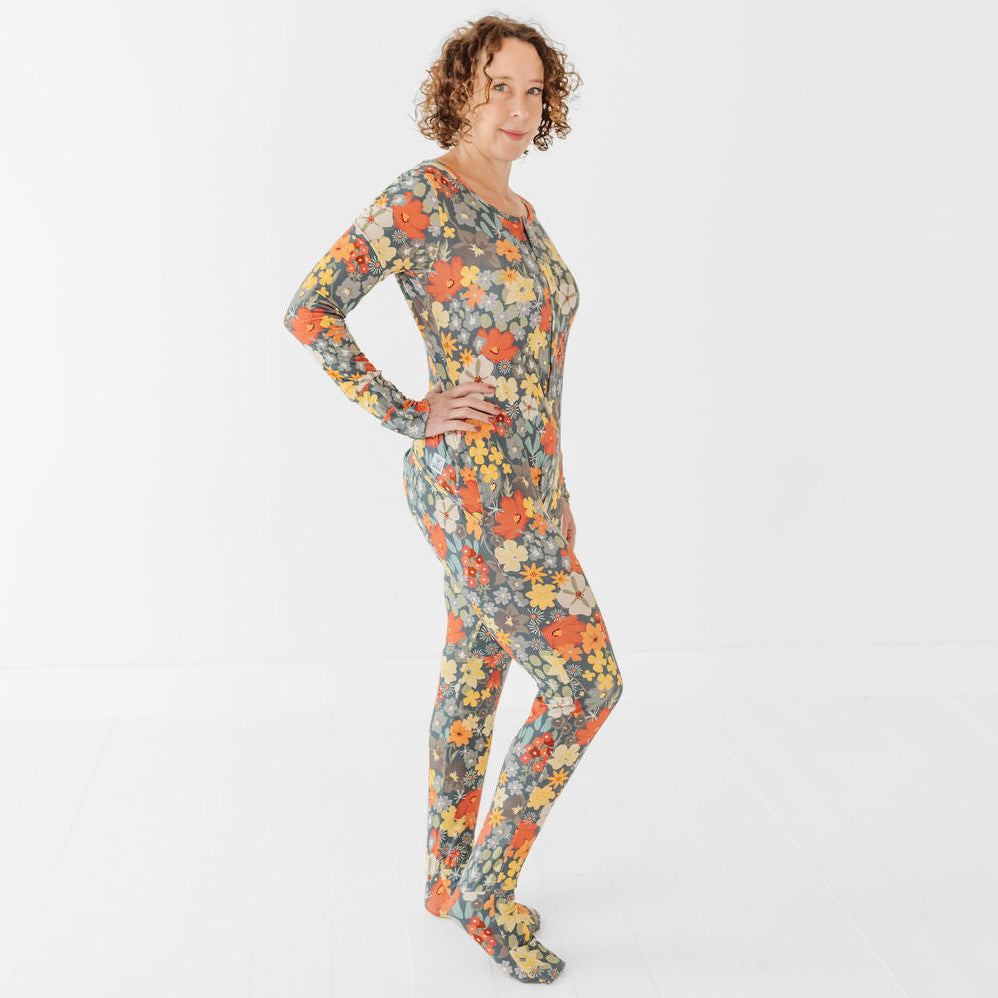 Woman wearing a floral patterned outfit on a white background