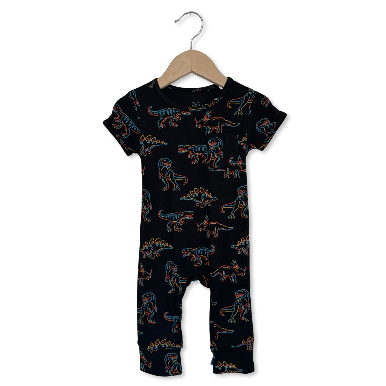 Black baby romper with dinosaur pattern on a hanger against a white background