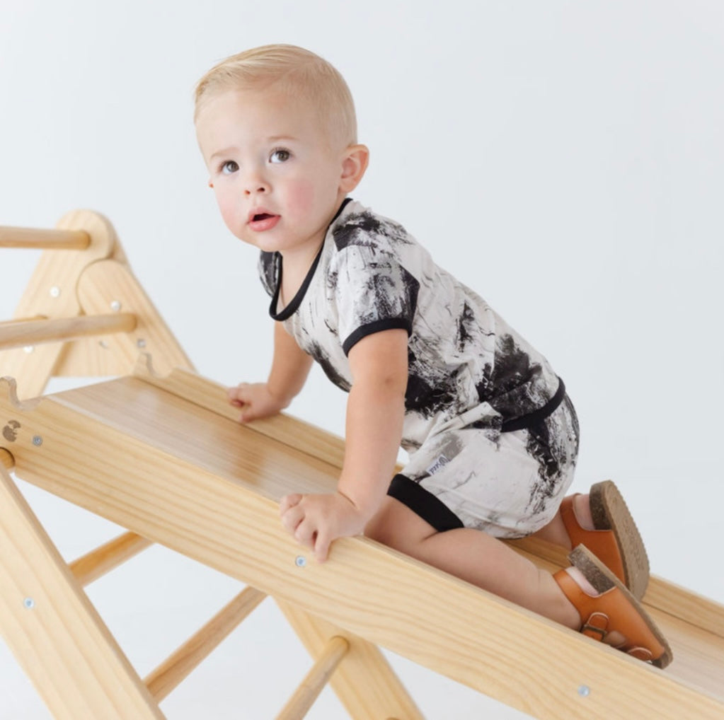 Caden & Crew Black Art Shorty Romper