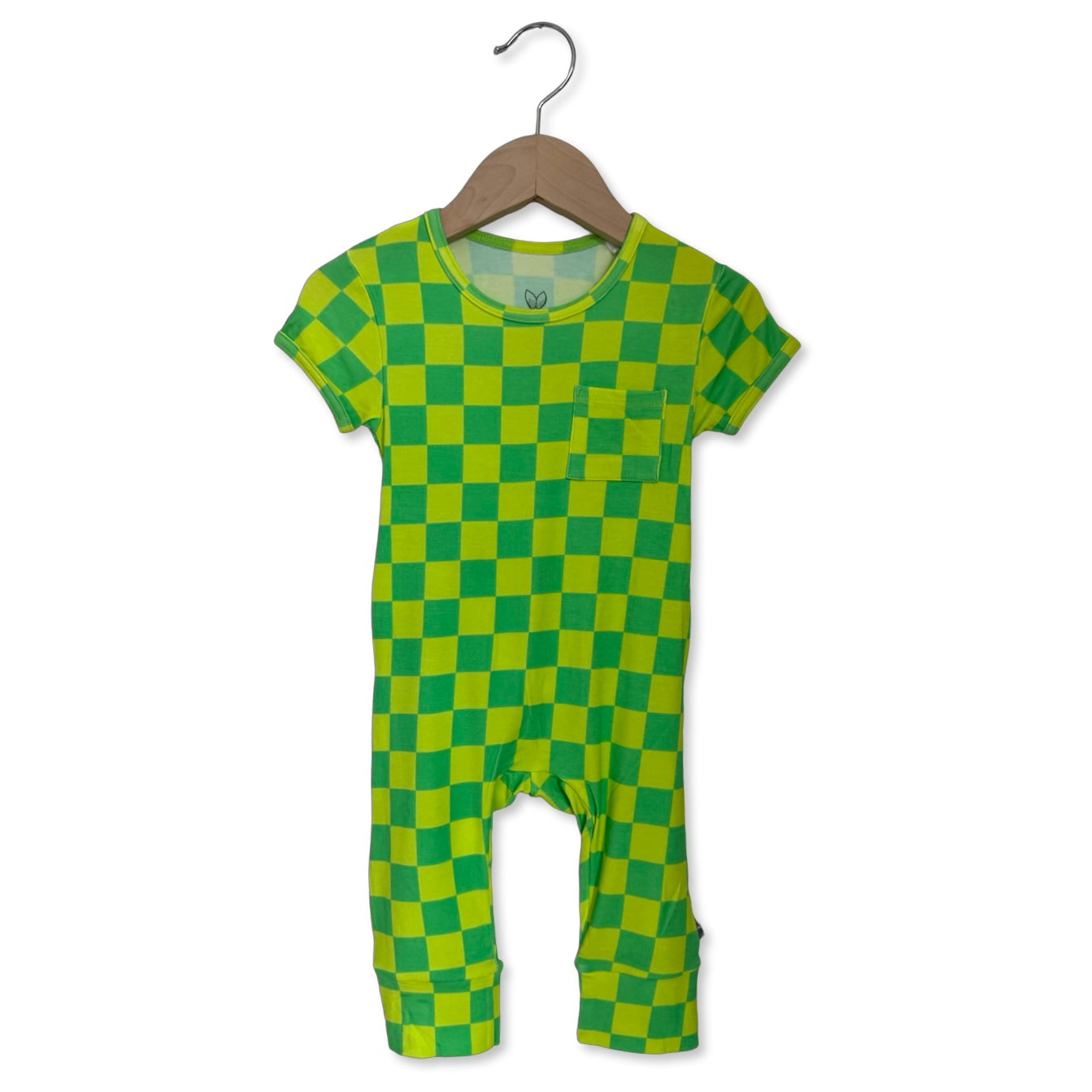 Green checkered baby onesie on a hanger against a white background
