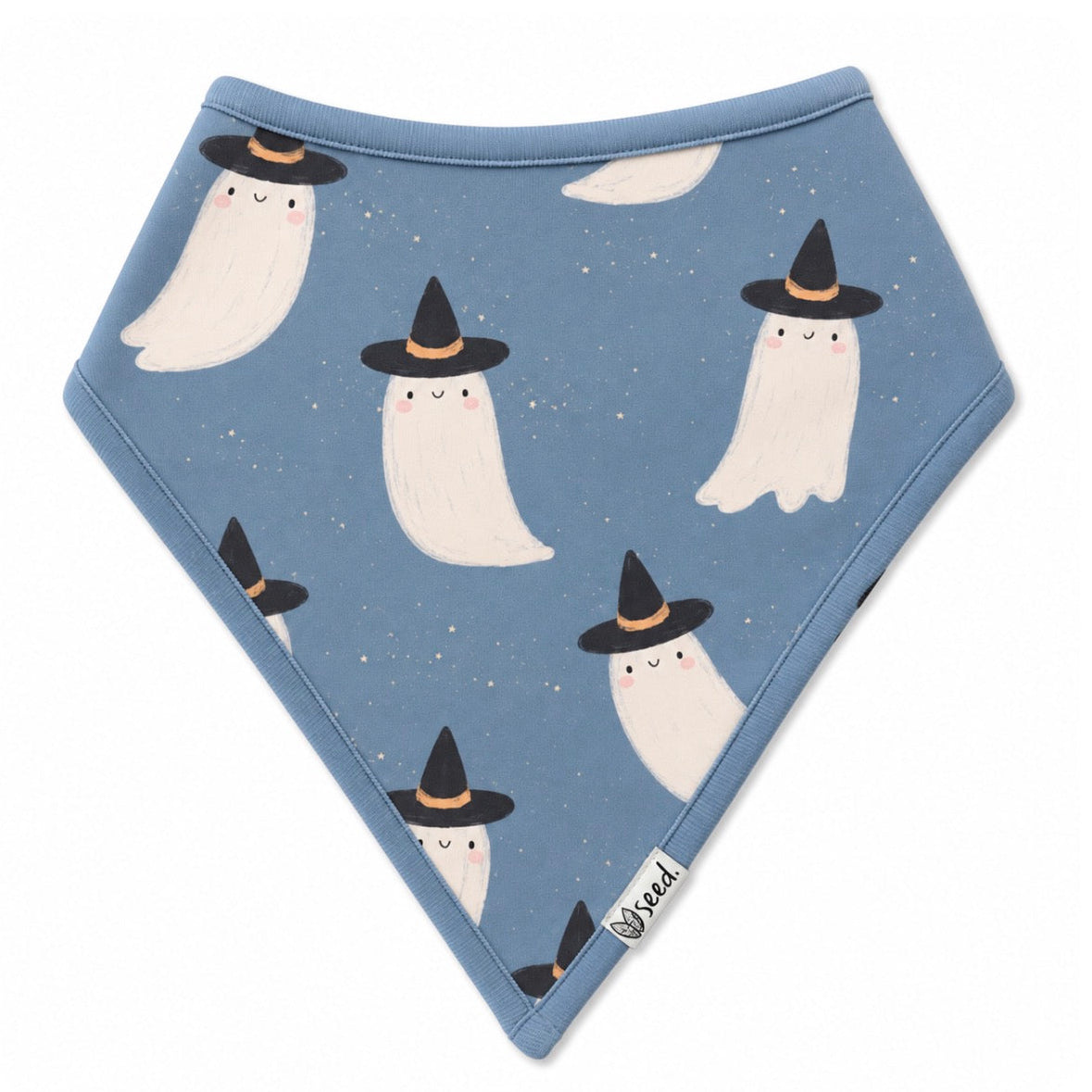 A triangular baby bandana bib in dusty blue, featuring a repeating pattern of cute white ghosts wearing black witch hats. The bib is laid flat on a clean white background, with a small white brand tag near the bottom right corner.