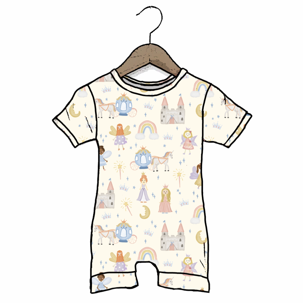 Children's onesie with fairy tale design on a hanger against a white background