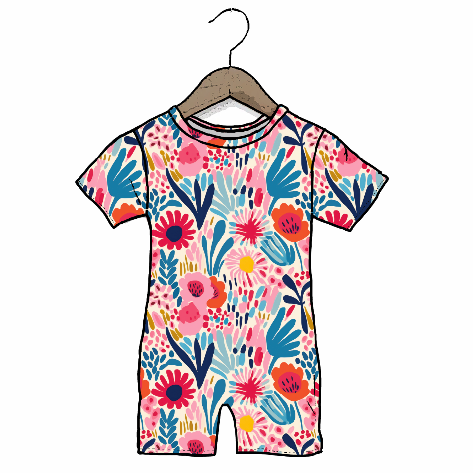 Colorful floral-patterned baby romper on a hanger against a white background