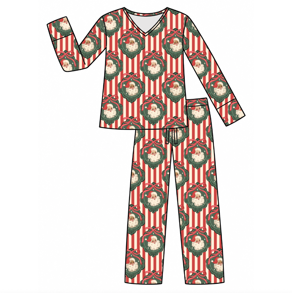A flat-lay digital mockup of a two-piece pajama set featuring a festive Christmas print with red and white vertical stripes, green wreaths, and Santa Claus silhouettes, shown on a plain white background.