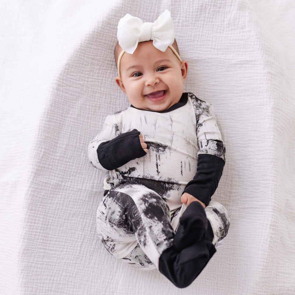 Caden & Crew Black Art for Autism Day to Night Romper